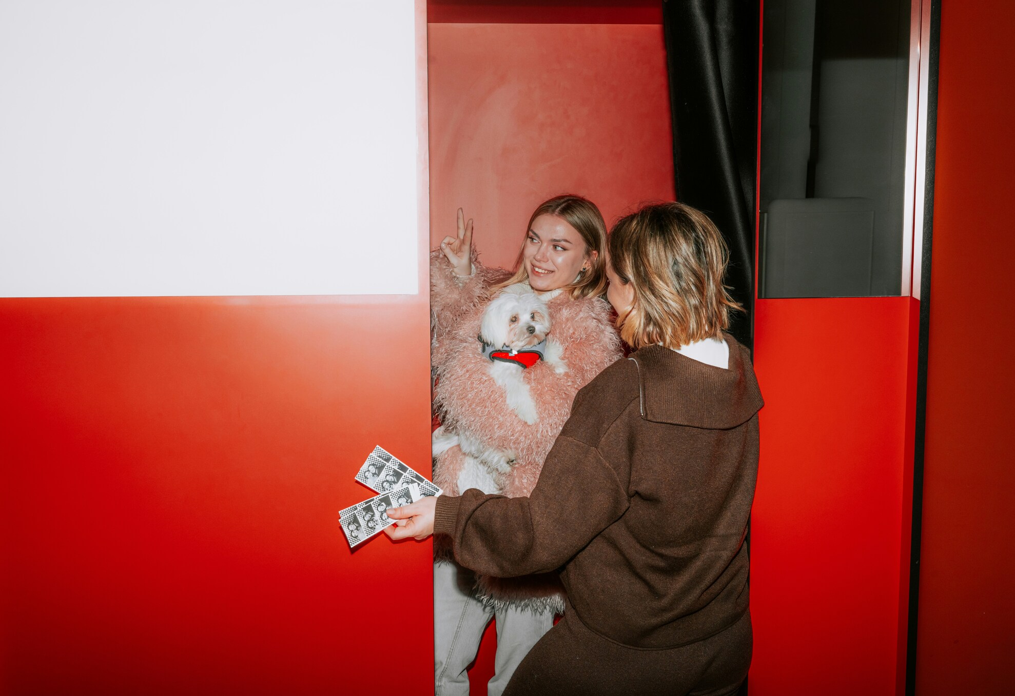 Owner taking a selfie with their fluffy dog